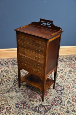 Lot 140 - An Edwardian mahogany and inlaid five drawer...
