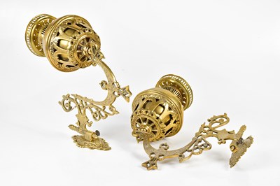 Lot 2239 - A pair of brass wall mounted oil lamps, 33cm.