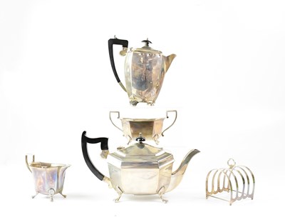 Lot 876 - A George V hallmarked silver tea service...