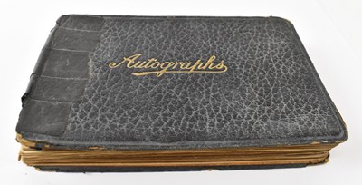 Lot 396 - A leather bound autograph book containing...