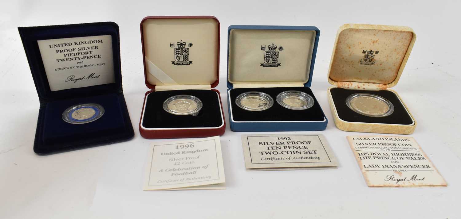 Lot 1006 - ROYAL MINT; four cased silver proof coin sets...