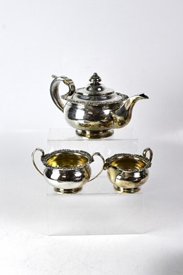 Lot 877 - A matched hallmarked silver three-piece tea...