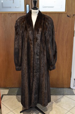 Lot 436 - A Harrods mink fur coat.