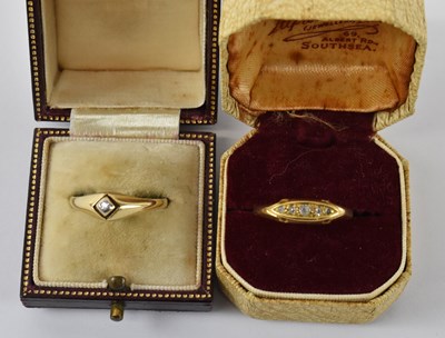 Lot 912 - An 18ct yellow gold ring (cut), set with five...