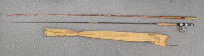 Lot 300 - A vintage bamboo fishing rod and reel.