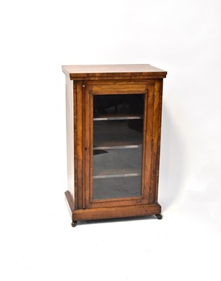 Lot 56 - An early 20th century burr walnut pier cabinet...