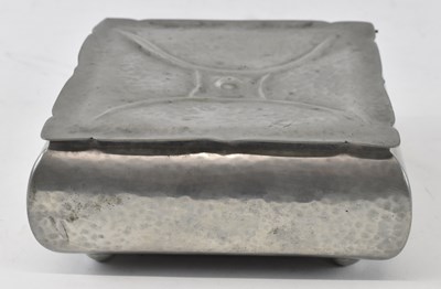 Lot 463 - An Arts and Crafts hammered pewter cigarette...