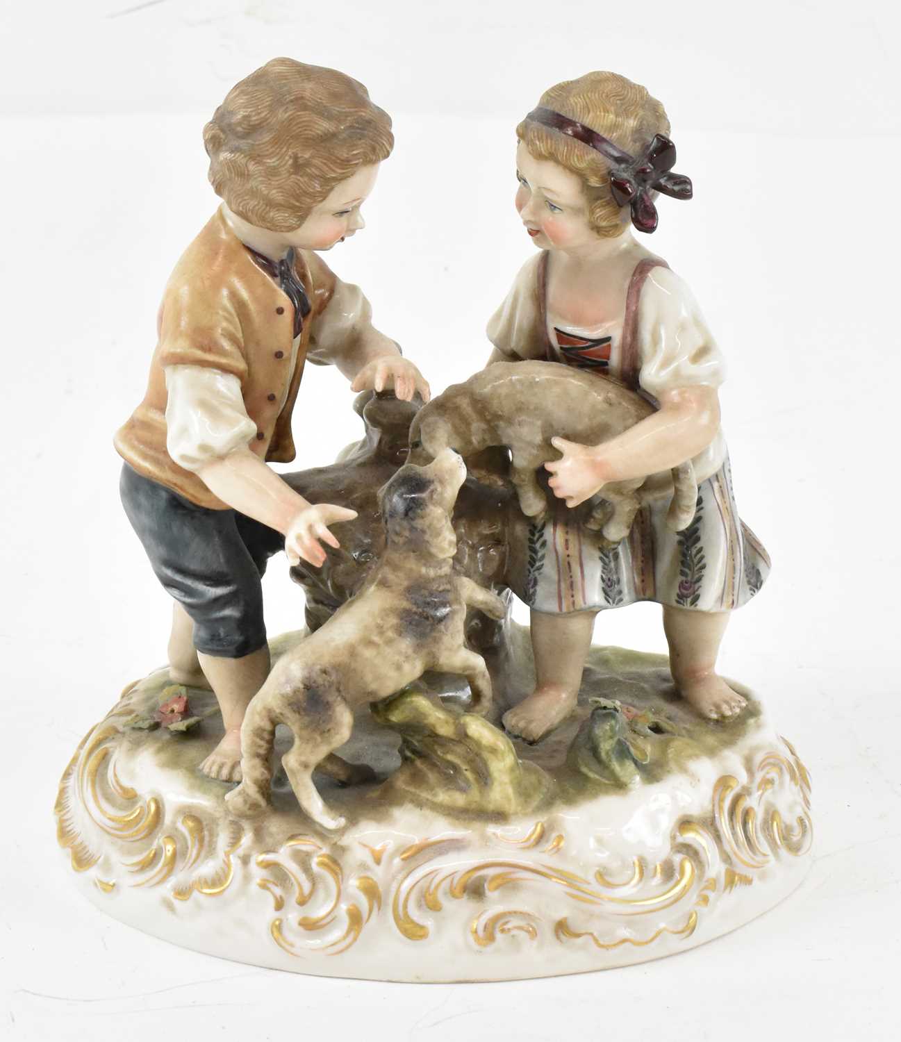 Lot 488 - A late 19th century porcelain figural group,...