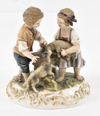 Lot 530 - A late 19th century porcelain figural group,...