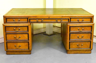 Lot 6 - A 19th century oak partner's desk with gilt...
