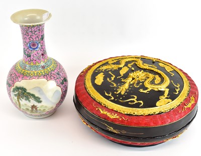 Lot 648 - A modern Chinese pink ground vase decorated...