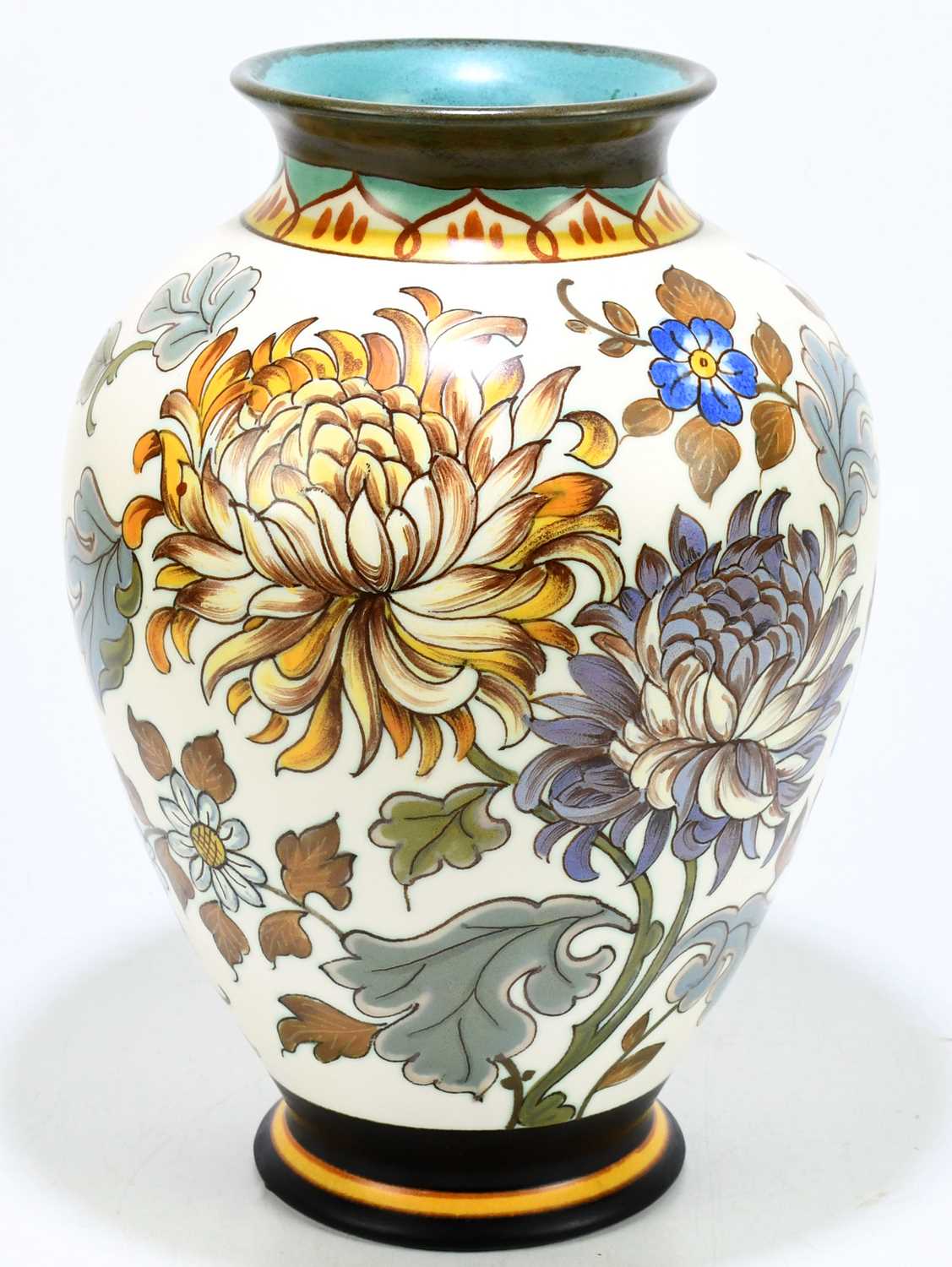 Lot 864 - ROYAL GOUDA; a faïence vase decorated with...