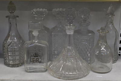 Lot 574 - A group of eight cut glass decanters.