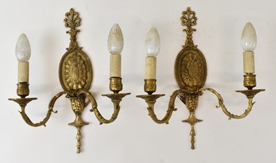 Lot 132 - A pair of French style brass wall mounted...