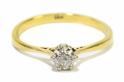 Lot 1099 - An 18ct yellow gold and diamond solitaire ring,...