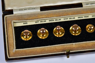 Lot 1144 - A cased set of six 9ct gold shirt studs,...