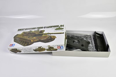 Lot 4486 - TAMIYA; a West German tank, Leopard A4, a...