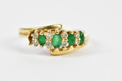 Lot 160 - A 14ct yellow gold emerald and diamond dress...