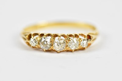 Lot 120 - An 18ct yellow gold graduated five stone...