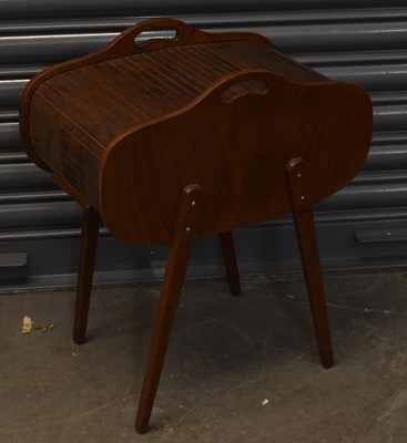 Lot 70 - A retro teak effect sewing table with all...