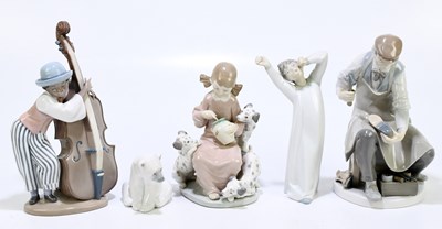 Lot 594 - LLADRO; three figure group comprising 'Cobbler'...