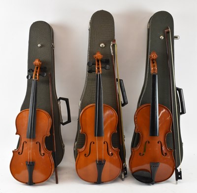 Lot 426 - Three cased half size modern Romanian violins,...