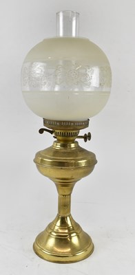 Lot 133 - A late 19th century brass oil lamp with...