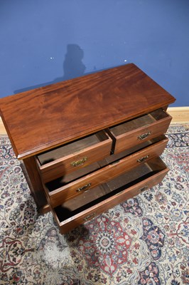 Lot 19 - A Edwardian walnut chest of two short over two...