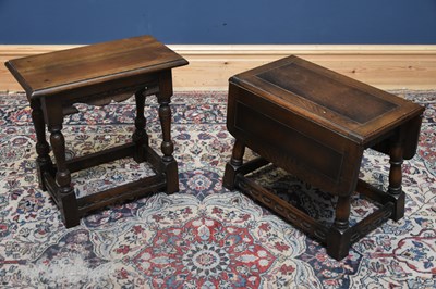 Lot 142 - A reproduction oak joint stool on block feet...