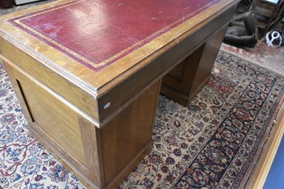 Lot 31 - An early 20th century oak pedestal desk with...