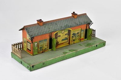 Lot 4348 - BING; a 1930s tin plate railway platform...