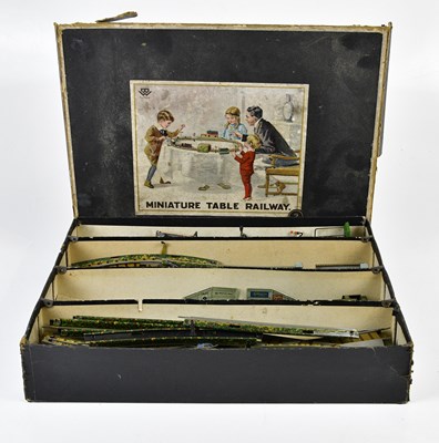 Lot 4332 - BING; a boxed miniature tin plate table...