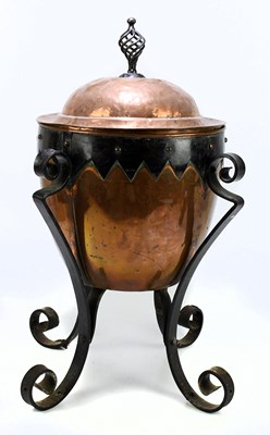 Lot 171 - An Arts and Crafts wrought iron and copper...