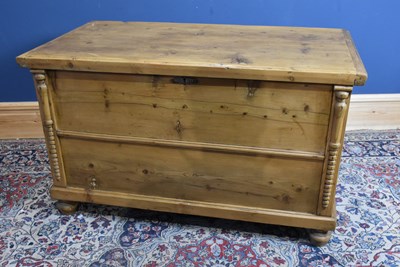 Lot 165 - A pine blanket box, raised on turned feet,...