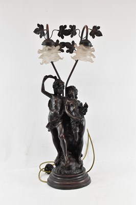 Lot 135 - A spelter figural table lamp, with two glass...