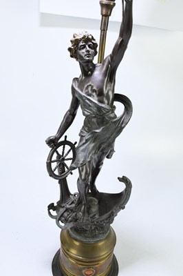 Lot 215 - An early 20th century bronzed spelter figural...