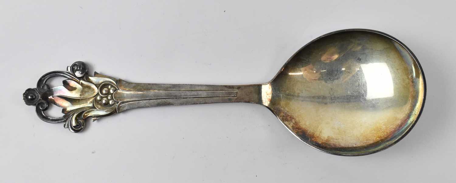 Lot 766 - A Danish sterling silver serving spoon,...