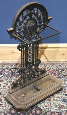 Lot 348 - A cast iron stick stand, the base with canted...