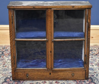 Lot 166 - A 19th century oak wall cupboard, with two...