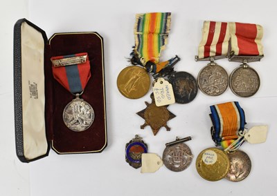 Lot 371 - A group of WWI medals comprising a named trio...