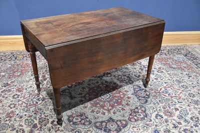 Lot 74 - An early 19th century mahogany Pembroke table,...