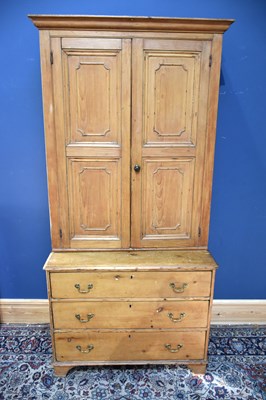 Lot 156 - A Victorian pine cupboard, with two panelled...