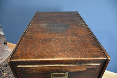 Lot 16 - An early 20th century four drawer oak filing...