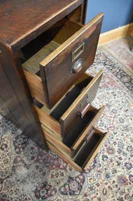 Lot 16 - An early 20th century four drawer oak filing...