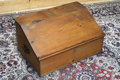 Lot 169 - An old pine clerk's desk, with cast metal...