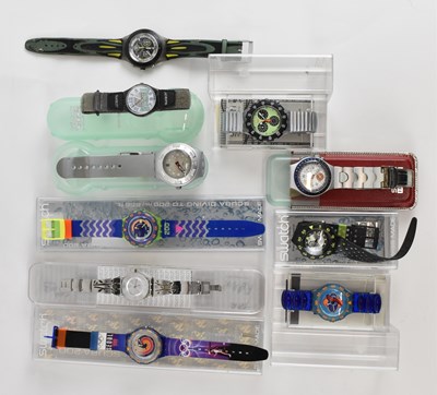 Lot 1036 - A group of ten Swatch watches including the...