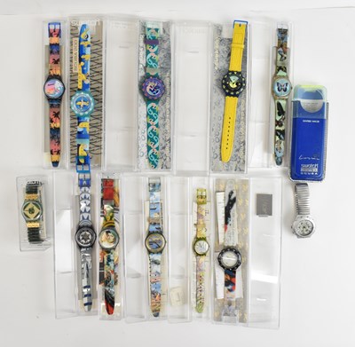 Lot 1037 - A group of eleven Swatch watches including the...