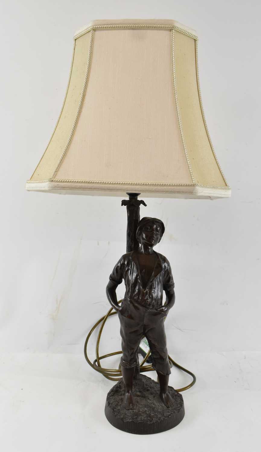 Lot 114 - An early 20th century bronze figural table...