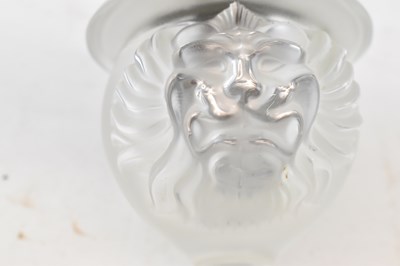 Lot 573 - LALIQUE; a French glass table lighter...