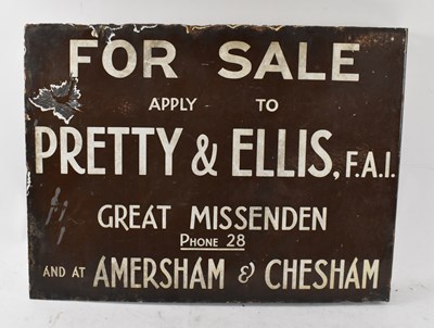 Lot 293 - A vintage enamel double sided advertising sign...